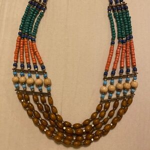 Multi-layered Multi-colored wood bead bib bohemian style necklace.